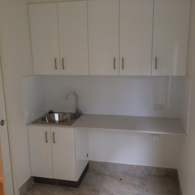 white laundry cabinets